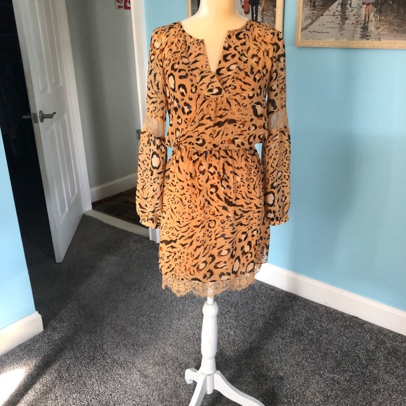 White House Black Market Dresses & Skirts - #Animal print dress with slip attached underneath.